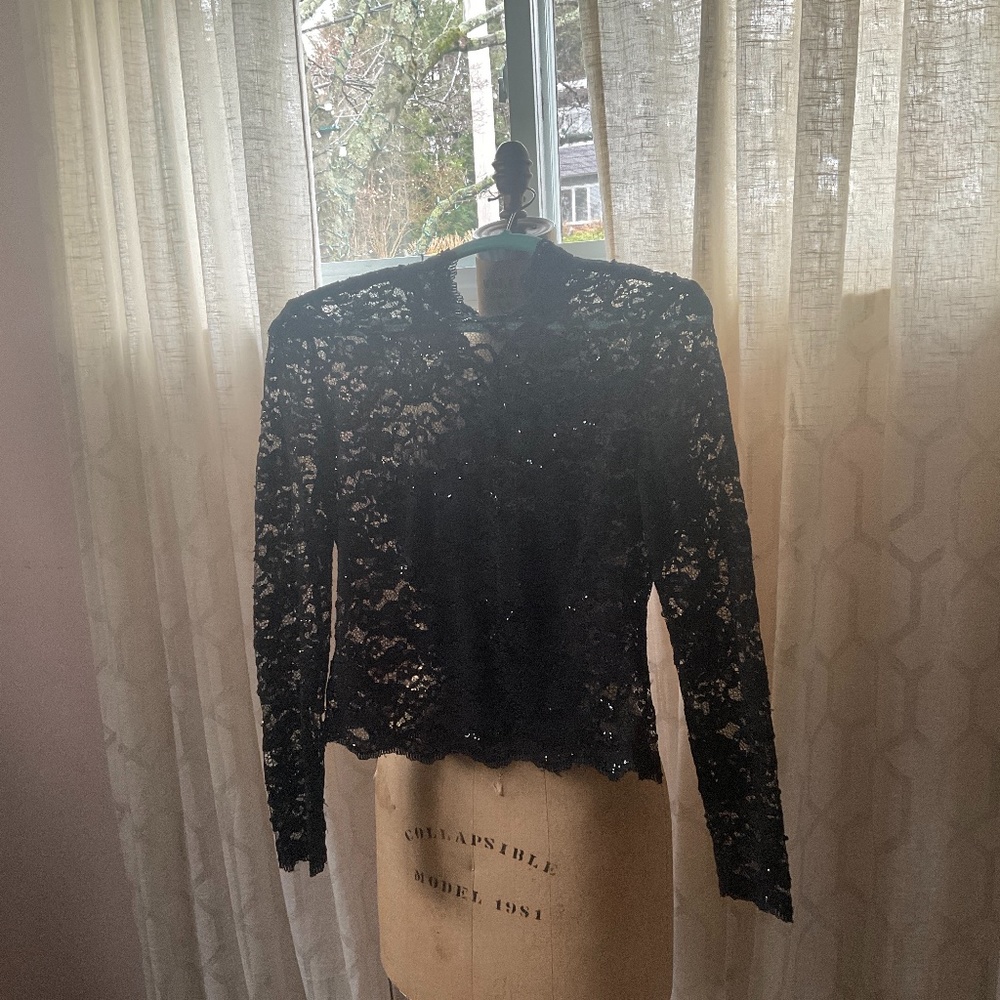 Remini size 2 black lace blouse